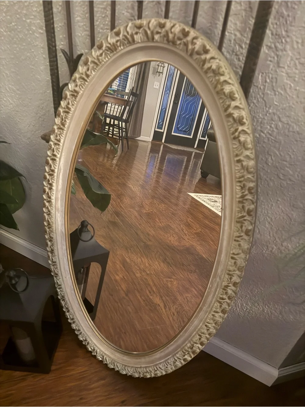 Vintage Oval Wall Mirror Featuring An Ornate, Off-White And Gold-Accented Frame